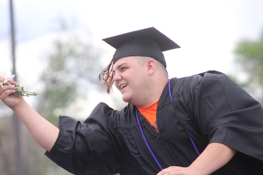 Michael Harrison catches a flower. 2020 Jeffco Public Schools graduates will be presented with a resilience cord, according to a letter from Jeffco Public Schools Superintendent Jason Glass.